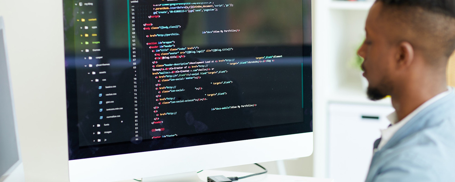 A programmer is developing a company website using various codes